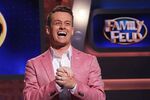 Family-feud-grant-denyer-pink-shirt