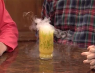Smoking tang.png (1.25 MB) Al being given a glass of "Smoking Tang" to poison him and turn Steve in, as seen in "The Egg and I"