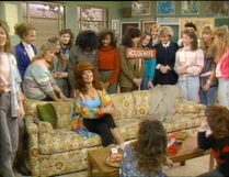 Classroom.png (1.42 MB) Peggy giving a lecture about being a homemaker during Mother-Daughter career day in one of the classrooms