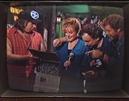 As the man showing off a magazine centerfold to news reporter Muffy in "The Chicago Wine Party"
