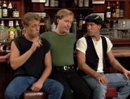 As James, smoking with the other barflys at Kelly's pool match