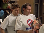 Al holding an edited copy of the centerfold for Miss March 1994, Neriah Davis