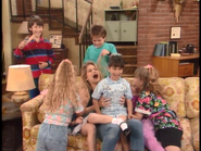As April Hubbard, sitting on Kelly Bundy's lap after declaring that she just went "wee-wee" on her.