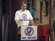 Al Bundy, the founder of NO MA'AM, "getting down to business at hand" in another meeting in his garage.