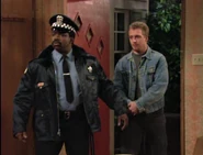 As the criminal that Officer Dan brings along into the Bundy Residence