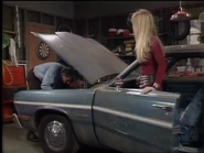 Untitled 7.png (1.07 MB) Al's blue Dodge with the racing stripe and "Gold Duster" badge by the front wheel during season 4