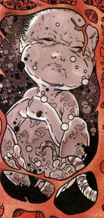 Эрик в утробе матери.