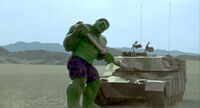 Hulk turning a tank over