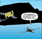 A jet flying over the ocean