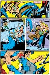 Batman fights the Iron Dragons