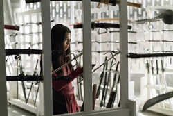 Elektra chooses her weapons to use in battle