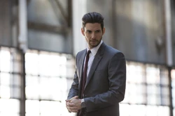 Russo stands inside of 