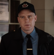 Mickey Maxwell as Officer