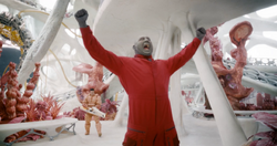 Drax cheers while fighting the 