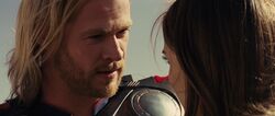 Thor looks at Jane