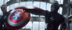 Captain America using his shield to fight his 