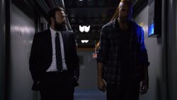 Oliver speaking with 