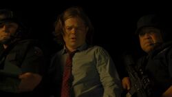 Nelson tries to find  on the rooftops