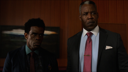 Donovan stands with his client 