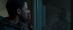 Okoye-ListensWithTChalla-InterRoom