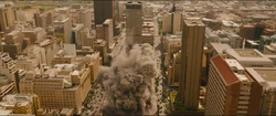 Iron Man and Hulk collapse a building