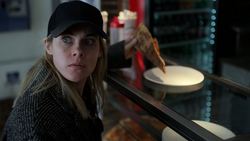 Trish Walker eating Pizza