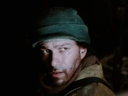 Tom Morello como Miembro de los Diez Anillos