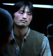 Grant Chang as Blind Worker