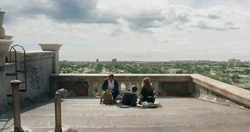 , , and  on Midtown’s roof