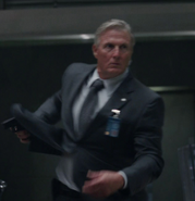 Unknown actor as S.H.I.E.L.D. Agent #3
