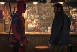 Deadpool and Logan at a bar