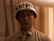 Ben Batt como Oficial de Enlistamiento