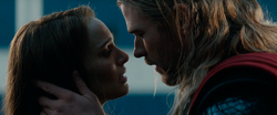 Jane and Thor about to kiss