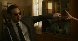 Matt Murdock catches brick