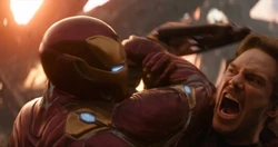 Iron Man stops  from interfering