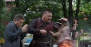 Wong cuts Cull Obsidian's hand