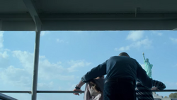 CastleFamilyLookingAtStatueOfLiberty