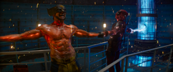 Wolverine and Deadpool hold hands