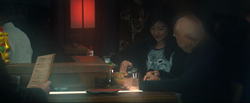 Nakajima having a drink with 