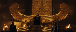 Loki en la silla del trono de Asgard