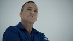 Coulson listens to Sibyl's explanation