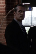 Unknown actor as S.H.I.E.L.D. Agent