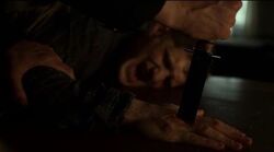 Punisher puts knife in Jake's hand.jpg