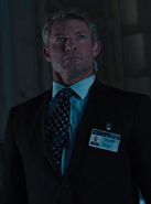 Unknown actor as S.H.I.E.L.D. Agent