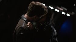 Malick kisses  while  burns