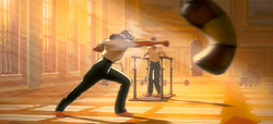 Carter knocks a punching bag