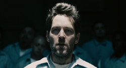 Lang undergoes the prison's goodbye ritual