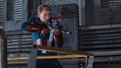 Captain America shooting at the attackers