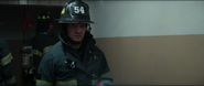 Clint Barton as a firefighter