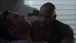 Mackenzie holds 's hand as he dies